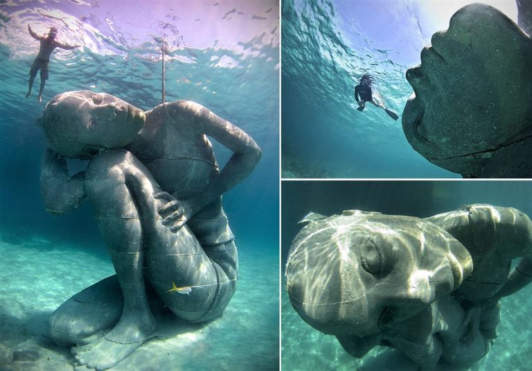 A Gigantic Underwater Girl Sculpture Carrying the Ocean in The Bahamas